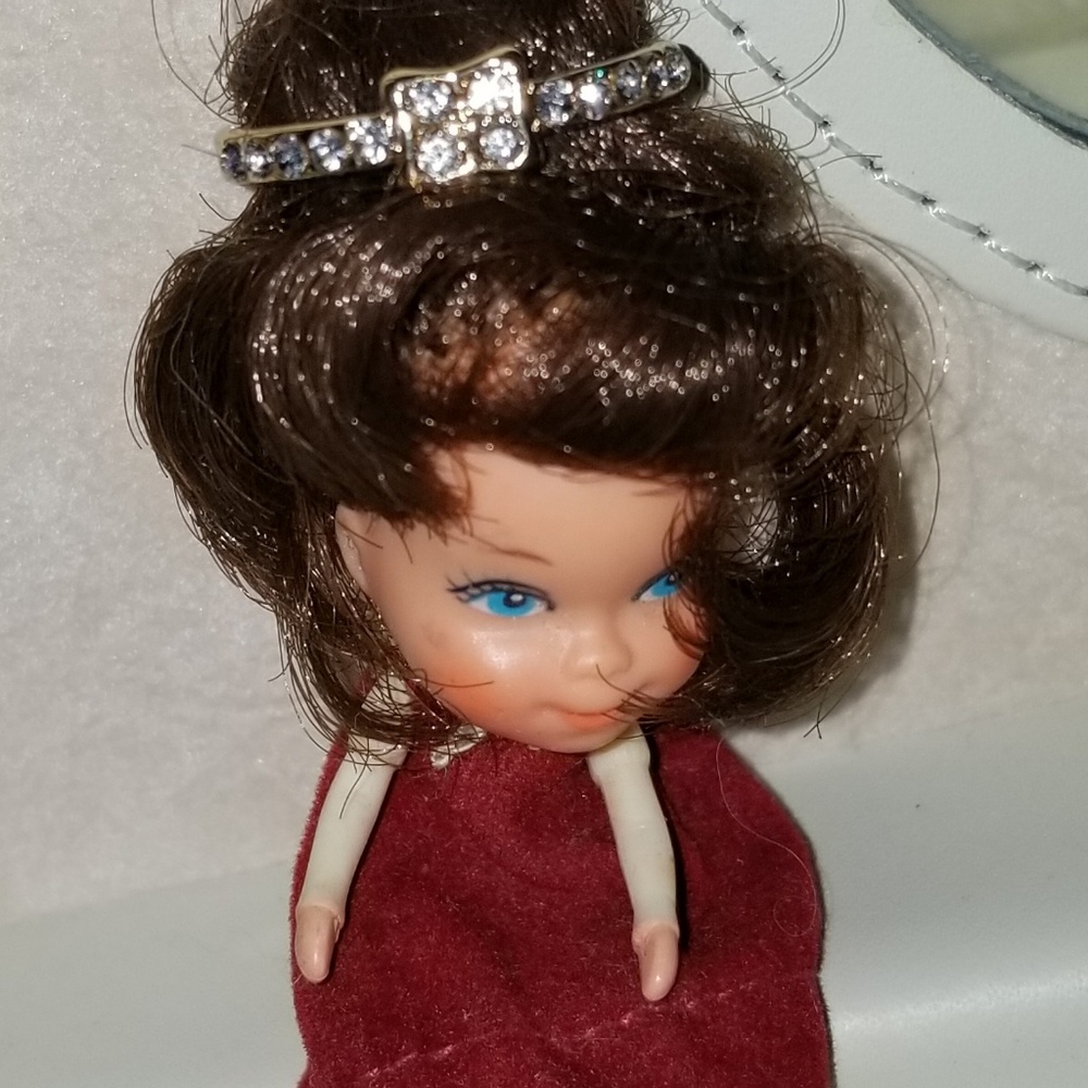 Mini sized doll  movable arms and head